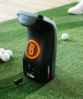 Launch Pro I Circle B Edition Golf Launch Monitor Bundle With Course GPS Overview on turf with golf balls and bag