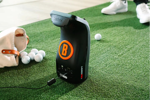 Launch Pro I Circle B Edition Golf Bundle With Net Return Bay 10 10 Ft Simulator Bay with Vice Tour balls on turf