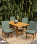 EarthFiber 4 Pack Outdoor Patio Dining Chair Cushions 20x44 Rain Proof Seat Pads, sage green, on wooden chairs, garden setting.