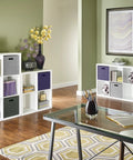 Four Cube Storage Shelf Organizer With Back Panel Easy Assembly Bookshelf In White Wood Finish displayed in a home office