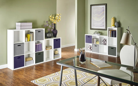Four Cube Storage Shelf Organizer With Back Panel Easy Assembly Bookshelf In White Wood Finish displayed in a home office