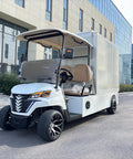 Cruise Around In Style With This Nimble 2 Seater Electric Golf Cart Rolling A Spacious Cargo Bed For Yard Work And Neighborhood Cruises Packed With A Smooth Brushless Motor, parked on a street.