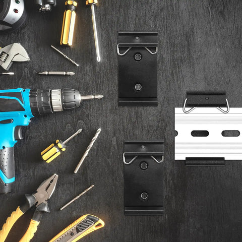 12 Pack Din Rail Mounting Clips One Point Oh Eight Inch Wide Snap In Universal Black Aluminum Alloy Relay Clips for 35mm Din Rail Switches and Injectors Durable Easy Install Great for Electrical Panels and Enclosures, shown with assorted tools on a workbench.