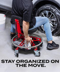 Man using under seat tool tray organizer for EZ Lift chairs, heavy duty steel construction with rubber mat, in garage setting