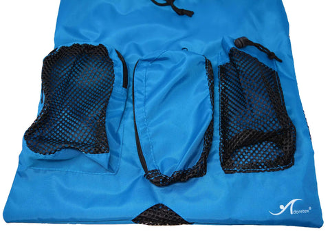 Close-up of Quick Dry Mesh Gym and Swim Equipment Bag with Drawstring Closure, showing three external mesh pockets on blue fabric.