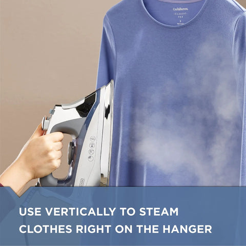 Hand using Allure Professional Steam Iron With Dynamic Steam Technology For Quick Wrinkle Busting on hanging blue shirt, model D3030.