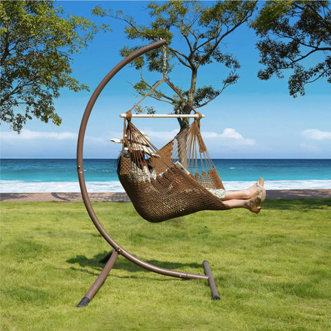 Caribbean Style Rope Hammock Chair With 40 Inch Steel Spreader Bar And Anti Slip Rings Soft Spun Cotton Rope by the sea