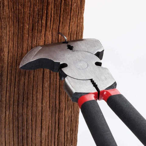 Heavy Duty Fence Pliers Set With Nail Puller, Staple Puller And Cutting Pliers For Construction And Carpentry in use on wood