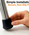 Kick The Squeaks 1.5 Inch Round Rubber Chair Leg Caps To Shield Hardwood Floors From Dents While Giving Your Furniture Grippy Traction And A Smooth Glide For Home Offices Dining Tables And Bar Stools Set Of Two Black installed on a chair leg.