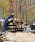 Top Shelf Kiln Dried Red Oak Board One Eighth Inch Thick By Four To Five Inches Wide And Twenty Four Inches Long Solid Hardwood Plank For DIY projects stacked at the sawmill.