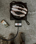 Top view of bacon cooking on a High Pressure Propane Burner For Outdoor Cooking With Heat Shield And Guard.