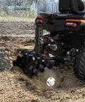 28-Inch Heavy-Duty Disc Plow Harrow With Universal 2-Inch Receiver attached to ATV tiling soil, black steel build