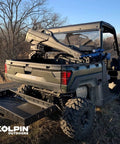 UTV with Stronghold Gun Boot L With Autolatch Mount Black Hard Case for long guns up to 52 inches, outdoors, open field view.