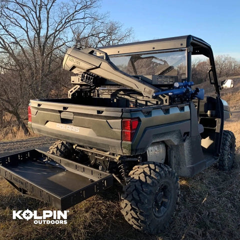 UTV with Stronghold Gun Boot L With Autolatch Mount Black Hard Case for long guns up to 52 inches, outdoors, open field view.