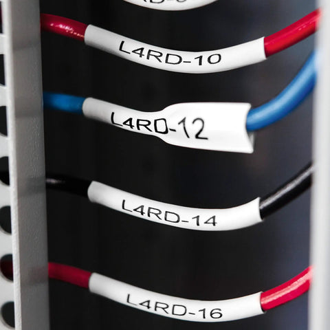 Rhino 4200 Industrial Label Maker with fast printing on pro-grade cable wraps displaying wire labels L4RD-10 to L4RD-16.
