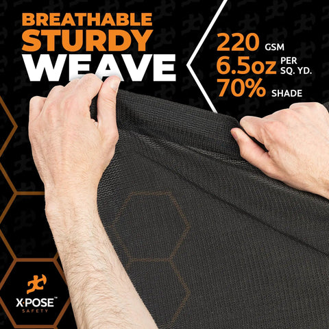 Hands holding Heavy Duty Mesh Tarp 12 By 26 Feet Multipurpose Protective Cover with Air Flow, emphasizing breathable sturdy weave.