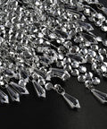 Close-up of sparkling silver beads and acrylic droplets on Large Three Tier Beaded Chandelier Lampshade, chrome frame detail