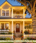 168Ft Outdoor LED String Lights With 600 Warm White LEDs Clear Wire Waterproof Plug In For Patio Garden Pergola Tree Decor Wedding Party Holidays Christmas Bedroom Vibes illuminating a house and tree.