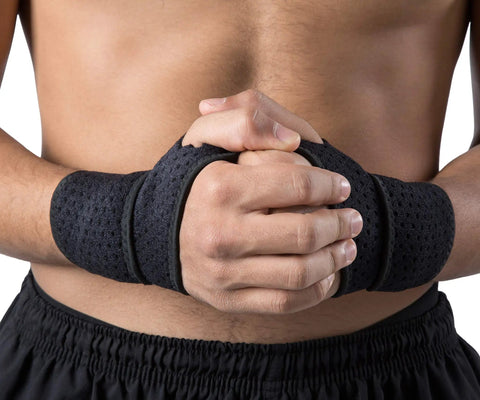 Two Pack Wrist Compression Straps And Wrist Braces For Fitness And Weightlifting, black, worn by person, medium close-up front view.