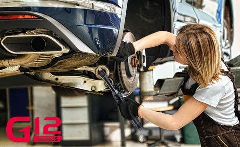 Mechanic using 12V Cordless Extended One Quarter Inch Ratchet Wrench Kit With LED Light, 30 Ft Lbs Torque on car wheel