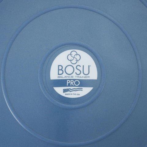 Close-up of the Bosu Pro label on the Half Ball Balance Trainer 26 Inch Pro Stability Dome For Home Gym Cardio And Strength Training A Dope Commercial-Grade Fitness Gear With Guided Workouts And Hand Pump For Core Stability And Full Body Training.