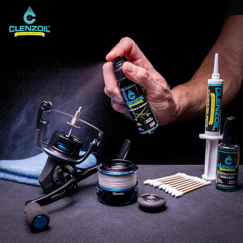 Spray bottle from Marine Reel Care Kit with oil and grease for freshwater and saltwater reels, surrounded by maintenance tools.