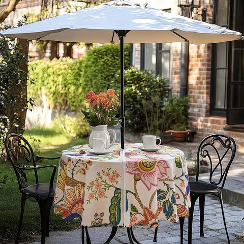 60 Inch Round Outdoor Tablecloth With Umbrella Hole And Zipper Spillproof And Wrinkle Free Paisley Patio Cover For Spring And Summer Backyard Parties BBQ Decor And Outdoor Dining on a patio table with umbrella and chairs
