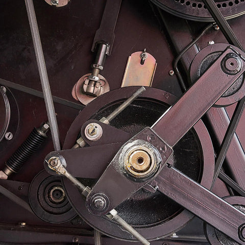 Close-up of machinery featuring the 43 Inch Inner Length B Section Rubber Drive Belt For V Belt Systems Neoprene Construction Oil Water Solvent Resistant With Even Load Distribution And Superior Wear Resistance.