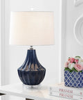 Navy Blue Ceramic Table Lamp 24.5 Inch For Bedroom And Living Room with white linen shade on a modern desk, fluted gourd base