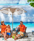 Family enjoying Outdoor Misting System for Patio and Garden Beat the Heat With 50 Ft Cooling Mist Kit under beach umbrella