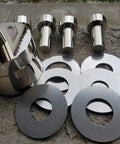 Coin Ring Puncher And Spacer Set For DIY Jewelry Making 5 Punch Tool with spacers and metal punches displayed on concrete surface.