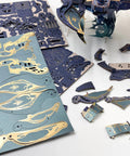 3D Wooden Puzzle For Adults Whale Ark Model With Mechanical Motion And Ocean Sounds DIY Building Kit For Creative Home Decor And STEM Projects In Starlight Blue, Eight To Ten Hours Assembly, Challenging Yet Rewarding. wooden puzzle pieces laid out on a white table