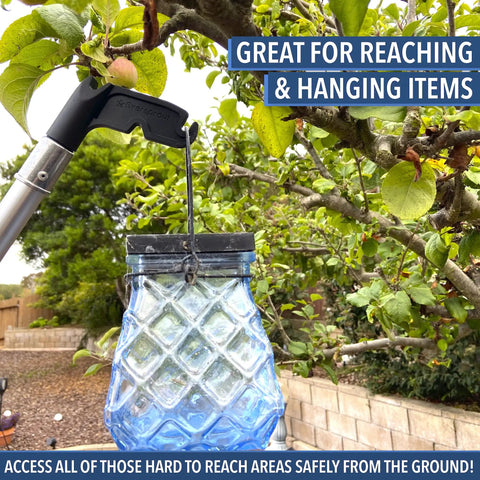 Must Have Utility Hook For Hanging String Lights And Bird Feeders Reaching High Places Lightweight Design Fits On Three Quarters Inch Acme Thread Pole Tips Hook Only No Pole shown holding a blue glass lantern in a tree