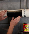 Heavy Duty Rubberized Waterproof Tape being applied to pipe, black 4 in by 5 ft, ideal for patching leaks and sealing repairs underwater