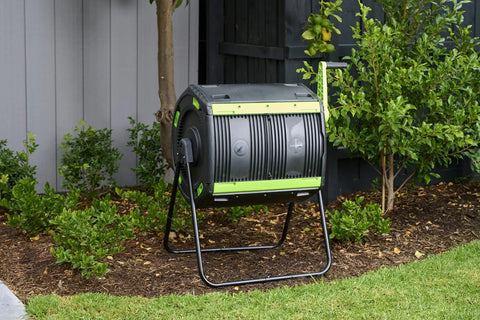 65 Gallon Dual Chamber Outdoor Compost Tumbler For Food Waste And Yard Waste Tough As Nails Heavy Duty Spill Proof Large Opening Bin For Your Kitchen Garden And Homestead in a garden