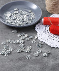 60 Sets Sew On Snap Buttons Kit DIY Friendly With 12mm 14mm And 16mm Metal Snaps for clothing crafts on gray bowl and lace mat