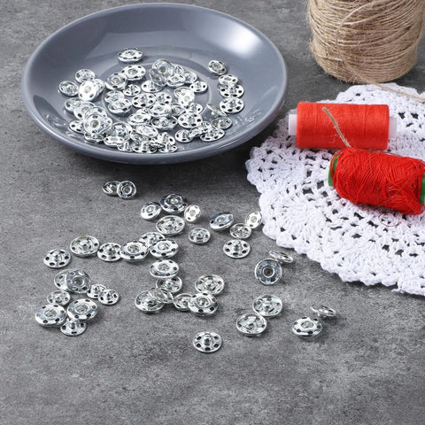60 Sets Sew On Snap Buttons Kit DIY Friendly With 12mm 14mm And 16mm Metal Snaps for clothing crafts on gray bowl and lace mat