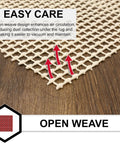 Close-up of non slip rug gripper pad for 2x10 area rugs on hard floors, showing open weave design with easy care features.