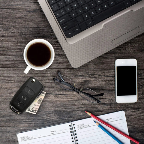 Lowkey Discreet Car Key Diversion Safe With Hidden Secret Compartment on desk with coffee, laptop, and phone