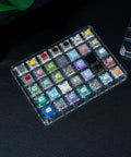 Magnetic And Mechanical Keyboard Switches Tester Kit 35 Piece Set Featuring 4 Magnetic Switches And 31 Mechanical Switches, Perfect For Quick Swaps, Tuning Your Board, And Real Deal Keyboard Enthusiasts. clear plastic keyboard switch tester tray with 35 colored switches