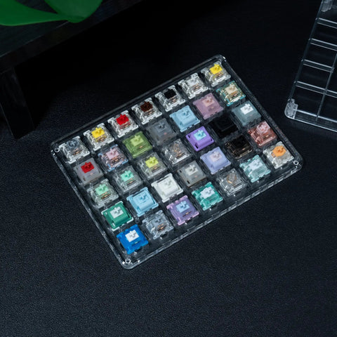 Magnetic And Mechanical Keyboard Switches Tester Kit 35 Piece Set Featuring 4 Magnetic Switches And 31 Mechanical Switches, Perfect For Quick Swaps, Tuning Your Board, And Real Deal Keyboard Enthusiasts. clear plastic keyboard switch tester tray with 35 colored switches