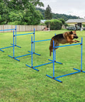 Dog jumping over 4 Piece Dog Agility Jump Set With Adjustable Heights For Versatile Training, ABS Construction, Blue, on grass