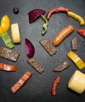 Heavy Duty Grill Mats Set Of 5 Nonstick BBQ Mats with assorted grilled vegetables and meats on a grill mat surface.