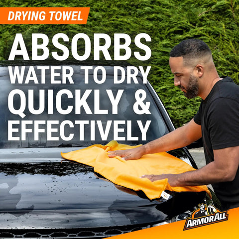 Man using drying towel on car hood from All In One Car Wash Kit With Ultra Shine Soap Plush Wash Mitt Microfiber Towel And Wax Buff For A Showroom Shine Without The Hassle.