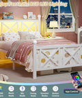 Next Level Twin White Bed Frame With Headboard And Footboard Featuring Built In Rgb Led Lights App Controlled, cozy bedroom setup.