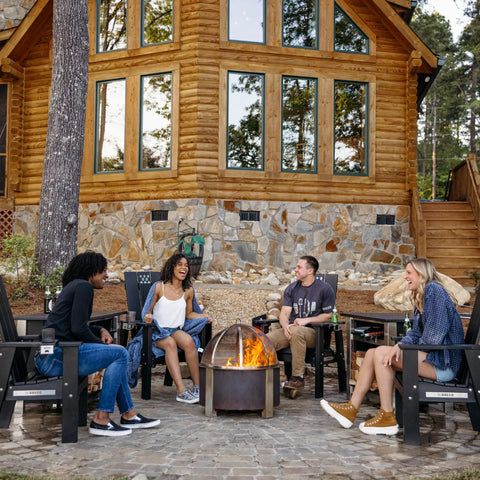 Smokeless Fire Pit For Outdoor Hangouts, 27.5 Inch X Series 24 Corten Steel Backyard Heater in use during cozy family night