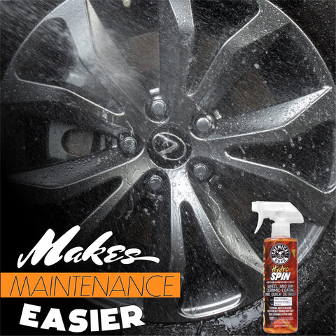 Close-up of a car wheel with HydroSpin Wheel And Rim Ceramic Coating And Quick Detailer Spray 16 Oz bottle visible.