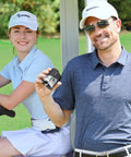 Man holding Golf Rangefinder With Slope, 800 Yards Range, 6X Magnification, Aluminum Alloy Body among golfers in cart