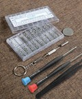 Eyeglasses And Sunglasses Repair Kit With Screws Tweezers Screwdrivers And Stainless Steel Nuts Includes 13 Screw Sizes handy kit laid out