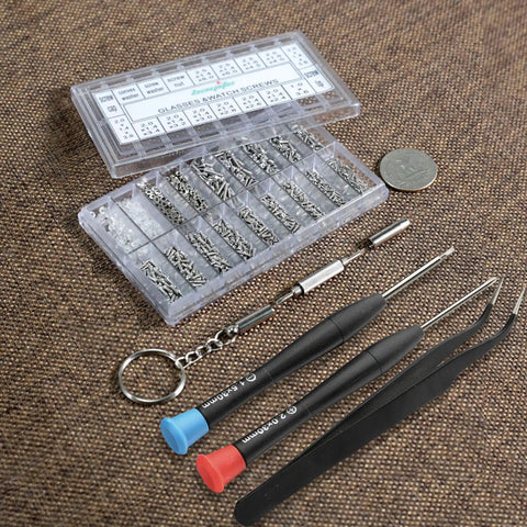 Eyeglasses And Sunglasses Repair Kit With Screws Tweezers Screwdrivers And Stainless Steel Nuts Includes 13 Screw Sizes handy kit laid out